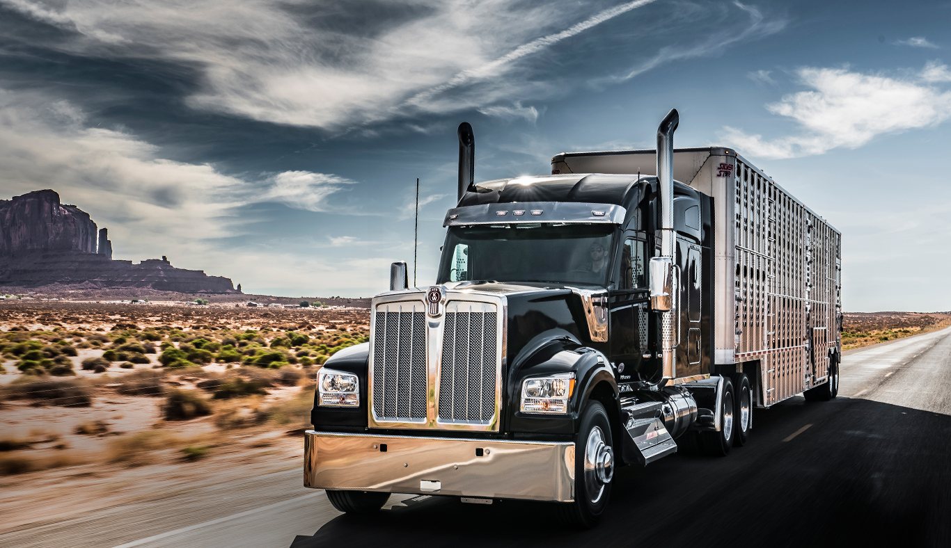 Kenworth W990 driving through desert